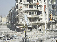  Buildings damaged by the government army, according to the opposition, are seen at Juret al-Shayah, in Homs April 10, 2012. Net photo.