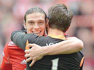 Andy Carroll is all-smiles after sending Liverpool to the FA Cup final with a 2-1 victory over Everton.