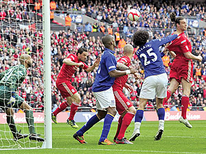 Craig Bellamy swings in a free-kick from the left and Andy Carroll does a great job of losing Fellaini to glance a header home. Net photo.