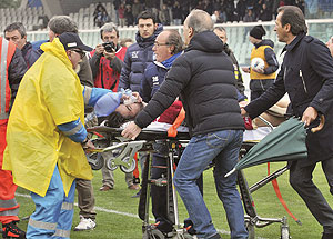 paramedics attend to Morosini. Net photo.