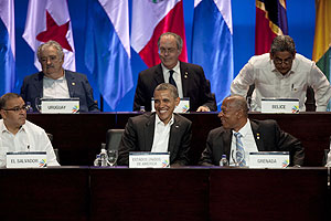 U.S. President Barack Obama (C, front) laughs during the opening ceremony of the Sixth Summit of the Americas in Cartagena, Colombia, April 14. Xinhua.