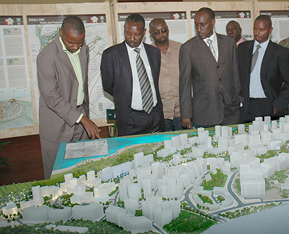 Officials inspect the Kigali City Master plan. The New Times / File photo.