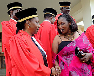Nirere (R) with Zainabu Kayitesi after Tuesdayu2019s swearing in ceremony. The New Times / J. Mbanda.