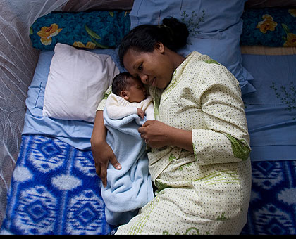 Sleeping under mosquito net reduces risk of malaria infection.  The New Times / File.