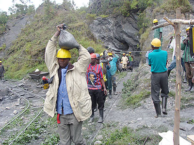 Miners of Gifurwe Wolfram Company in Burera District transporting minerals.The New Times / File.
