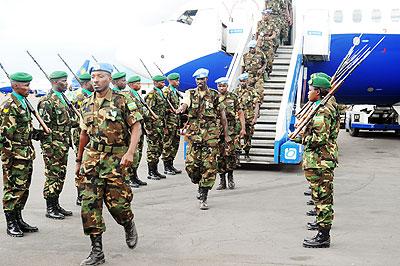 UNAMID peacekeepers on arrival at Kigali International Airport upon completion of their tour of duty in Darfur.  The Sunday Times/ Timothy Kisambira