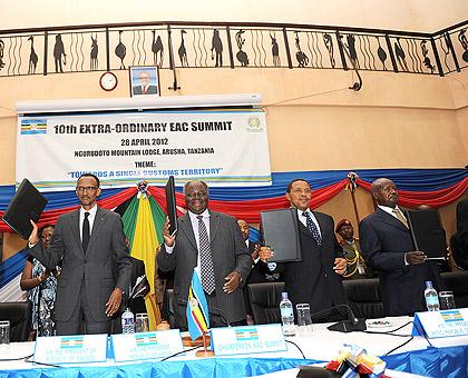 Presidents Paul Kagame (L), Mwai Kibaki, Jakaya Kikwete and Yoweri Museveni (R) at the end of the 10th extraordinary summit of EAC Heads of State held in Arusha, Tanzania yesterday. The Sunday Times / Village Urugwiro.