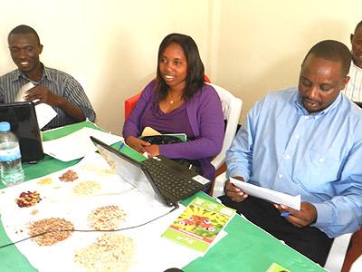 Agronomists testing grain quality. East Africa Grain Council (EAGC) will soon start supporting Rwandan farmers in post harvest management. The Sunday Times / S. Rwembeho.
