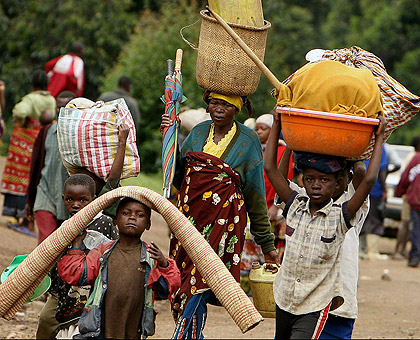Thousands of Congolese refugees have crossed to Rwanda and Uganda in recent days. Net photo.