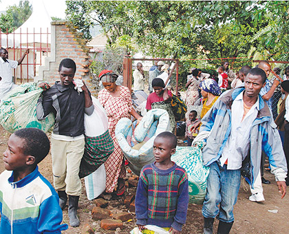 Congolese refugees crossing to Rwanda at La Corniche border in Rubavu yesterday. The New Times / Timothy Kisambira.