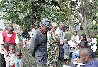 Refugees from DRC seeking asylum register at the border on entry into Rwanda on Tuesday.  The Sunday Times, / T. Kisambira