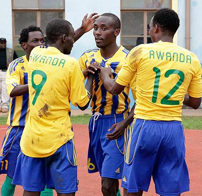 The U-20 players celebrate Tumaine Ntamuhangau2019s (centre with short 6) goal against Namibia yesterday at Amahoro stadium. The Sunday Times, T. Kisambira.