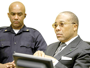 A sombre Charles Taylor listening to the ICC verdict. Net photo.