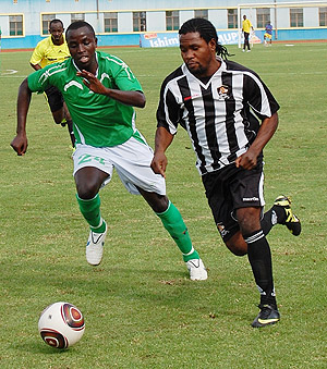 APRu2019s striker St. Preux Lionnel (R) beats Kiyovu defender Patrick Umwungeli to the ball. The Haiti-born international scored the second goal for the military side yesterday at Amahoro stadium. The New Times/ Etienne. Niyonshuti
