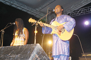 Lokua Kanza performs with his daughter Malaika Lokua at the 2011 KigaliUp festival. The New Times / File.