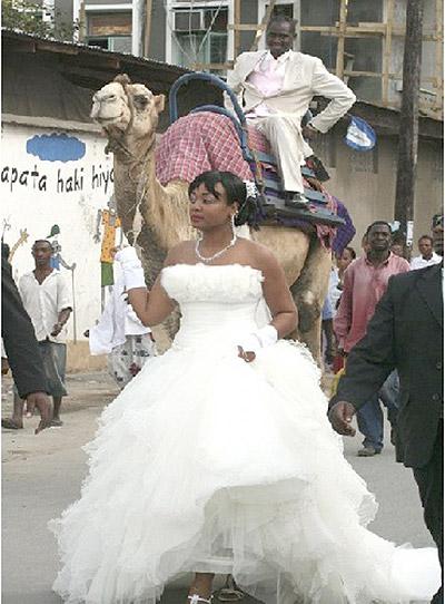 Katauti (on horse) and Oprah, at their wedding