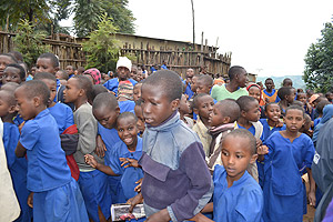School children coming from school inside Kiziba camp. The New Times / JP Bucyensenge