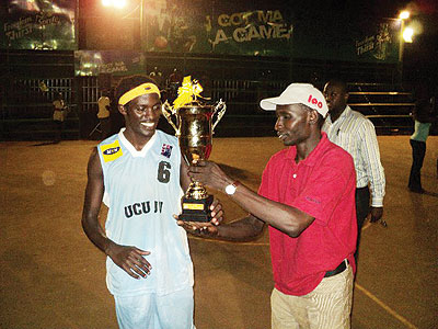 Habiyaremye Patrick Mwihoreze receiving the Division three championship trophy last year.
