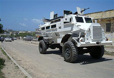 Peacekeepers from the African Union Mission to Somalia (AMISOM) ride in their armoured personnel carriers. Net photo