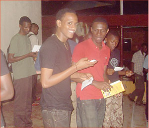 Movie fans leave the cinema in good spirits. The New Times / Patrick Buchana.