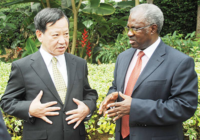 Japanese Ambassador to Rwanda Kunio Hatanaka (L) with Disaster management and Refugees Minister, Marcel Gatsinzi at a past function. The New Times/John Mbanda.