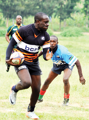 Buffaloes' Eric Mbarushimana makes a run for the try line in an earlier game against Gikondo Sharks. The New Times / File.