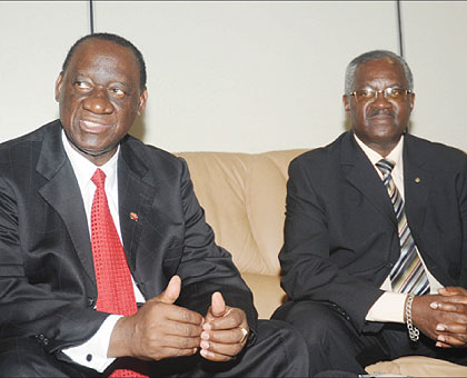 The head of a visiting Zambian parliamentary delegation, Lt Gen. Ronald Shikapwasha (L) and Rwandau2019s Minister of Disaster Management and Refugee Affairs, Gen. Marcel Gatsinzi, addressing a joint news conference after their meeting in Kigali yesterday. The
