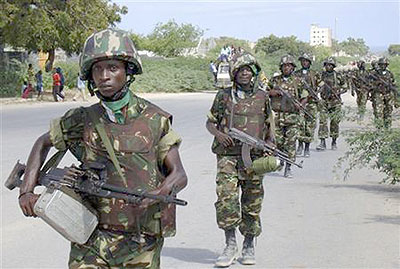 A group of African Union peacekeepers from Burundi walk along the streets of Mogadishu on their way to base October 12, 2008. Net photo