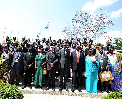 President Kagame in a group photo with Gacaca Judges (Inyangamugayo) and other delegates at the function to close Gacaca at Parliament yesterday. The New Times / Village Urugwiro.