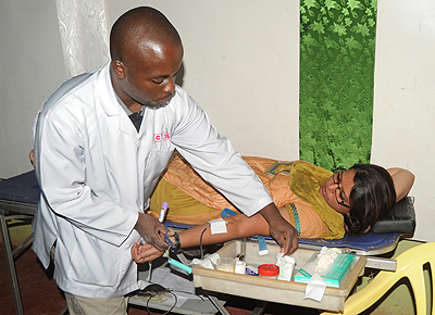 A woman donates blood in an exercise to save life. The Sunday Times / File.