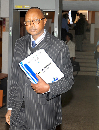 Auditor General Obadiah Biraro leaves Parliament after presenting his report on Friday. The Sunday Times /John Mbanda
