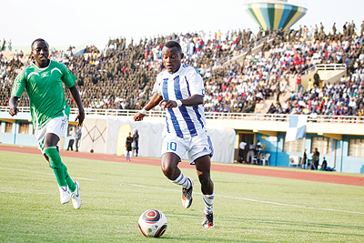 Rayonu2019s Sina Jerome (R) will have his work cut out when the Blues face APR today. The New Times/ T. Kisambira.