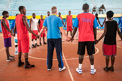 The U-18 team, observing a minute silence in remembrance of Jonathan Rutare who passed away in the United States. The team leaves this morning for Burundi. Photo: The New Times/R. Spector.