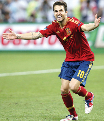 Spainu2019s Cesc Fabregas reacts after scoring the winning penalty goal against Portugal during the penalty shoot-out in their Euro 2012 semi-final match.  Net photo.