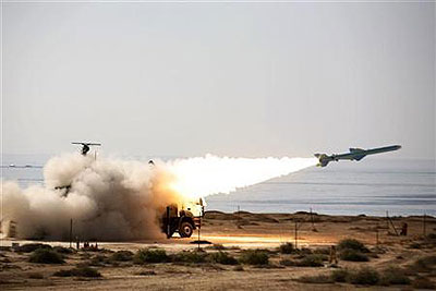 An Iranian long-range shore-to-sea missile called Qader (Capable) is launched during Velayat-90 war game on Sea of Omans shore near the Strait of Hormuz in southern Iran. Net Photo.