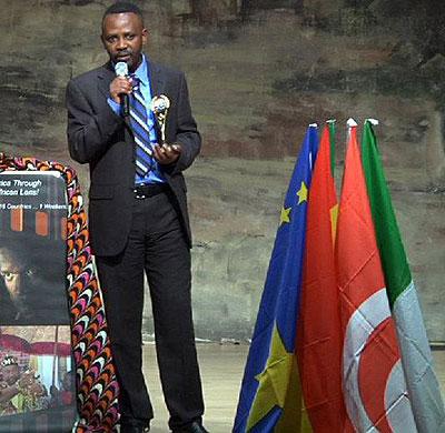 Ndahayo accepts the Award for Best Feature documentary at the Silicon Valley African Film Festival in 2011 for Rwanda Beyond.