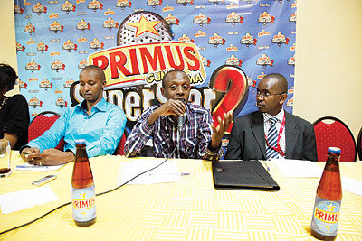 (L-R): Joseph Mushyoma, CEO of East African Promoters, Jean Pierre Uwizeye, Brand Manager of Primus and Heineken and Samuel Kariuki, Manager of PricewaterhouseCoopers at the news conference. The New Times / File.  