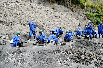 Workers at a mining site. The New Times / File.