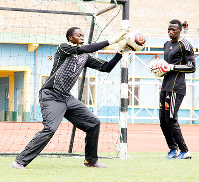 With the two Rwandan international goalkeepers Jean Luc Ndayishimiye (L) and Jean Claude Ndoli (R), APR should be in safe hands for the tournament. The New Times / T. Kisambira.