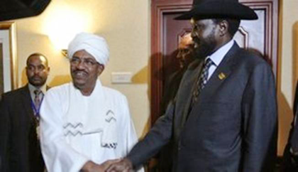 South Sudan's Salva Kiir (R) met his counterpart Omar al-Bashir at an African Union summit. Net photo.