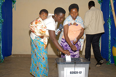 Women exercise their right to vote. The New Times/File.