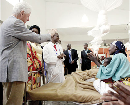 Cancer patients at Butaro Cancer Centre in Burera District welcome visiting former US President Bill Clinton and other officials yesterday. The New Times / Timothy Kisambira.