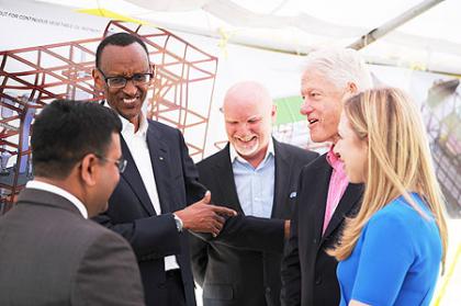 Vice Chairman of Mt.Seru Soyco Plant Arvin Patel with President Clinton and Chelsea Clinton. Kayonza, 19 July 2012 