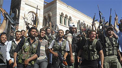 Members of the Free Syrian Army are seen in Azzaz, Aleppo province July 19, 2012.  Net photo.