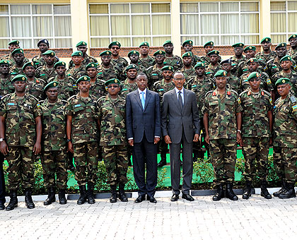 President Kagame (C) poses with senior defence and military officials, and the first intake of the Command and Staff College at Nyakinama Military School yesterday. The New Times- Village Urugwiro.