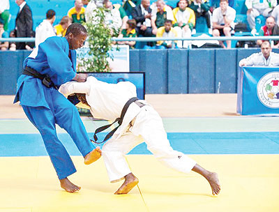 Rwanda's Yannick Sekamana (L) in action during the Africa senior Judo championships held in April in Morocco. The New Times/File.