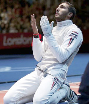 Egyptu2019s Alaaeldin Abouelkassem celebrates defeating Italyu2019s Andrea Cassara. Net photo.