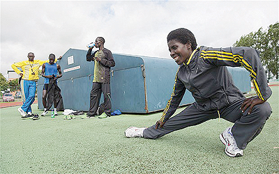 Rwandan Athletes, (R-L) Claudette Mukasakindi, Robert Kajuga, Jean Pierre Mvuyekure and their coach Innocent Rwabuhihi train in Suffolk ahead of the Games. The New Times/File.