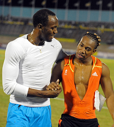 Olympic champion Usain Bolt (L) and rival-friend Yohan Blake will be the centre of attention in London. Net photo.