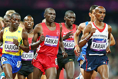Robert Kajuga (L) made an impressive Olympics debut, finishing 14th in the menu2019s 10,000m race won by Great Britainu2019s Mo Farah (R). Net photo. 